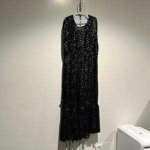 Very cool black dress with silver details throughout.